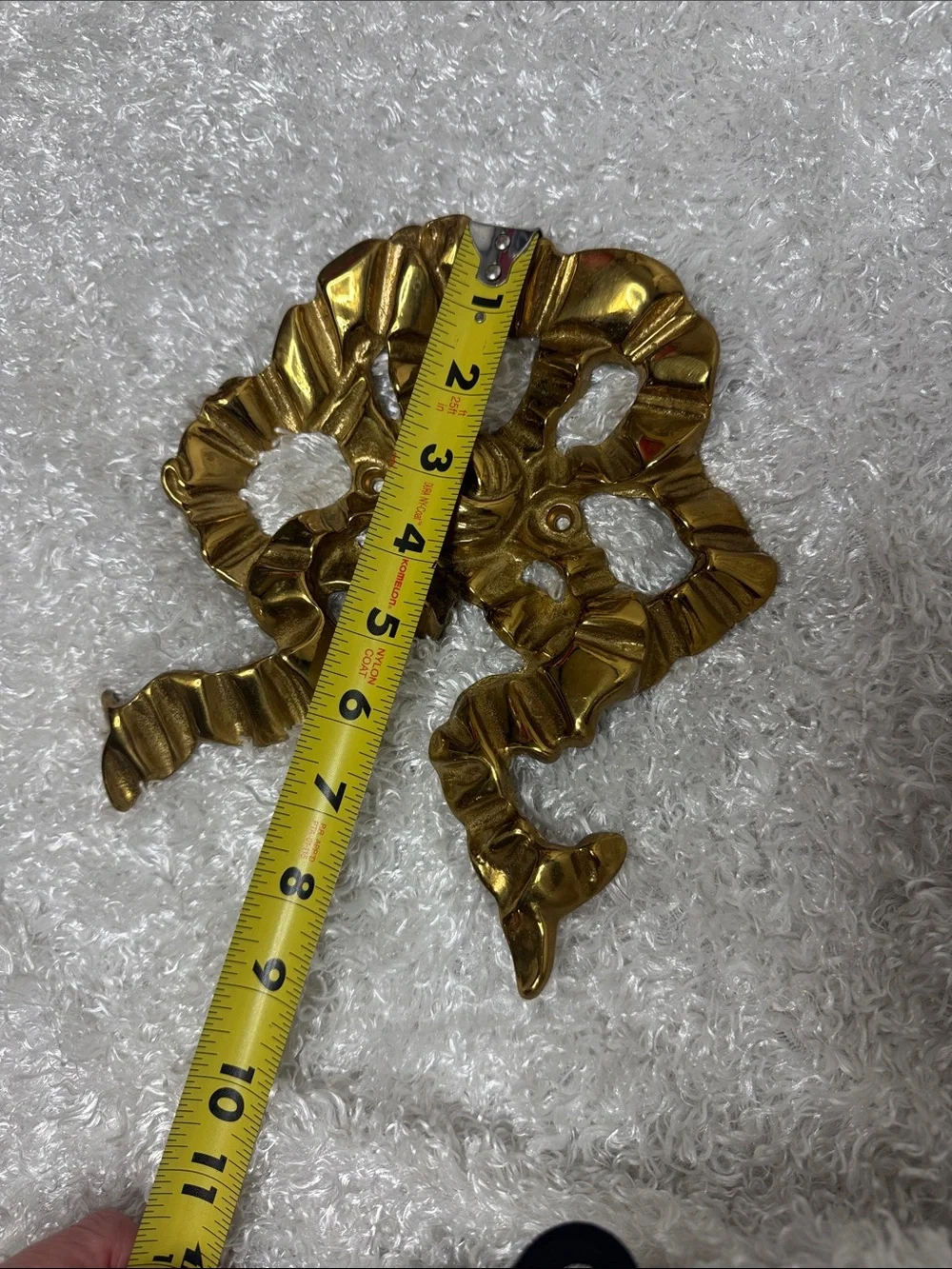 Heavy brass ribbon wall hook